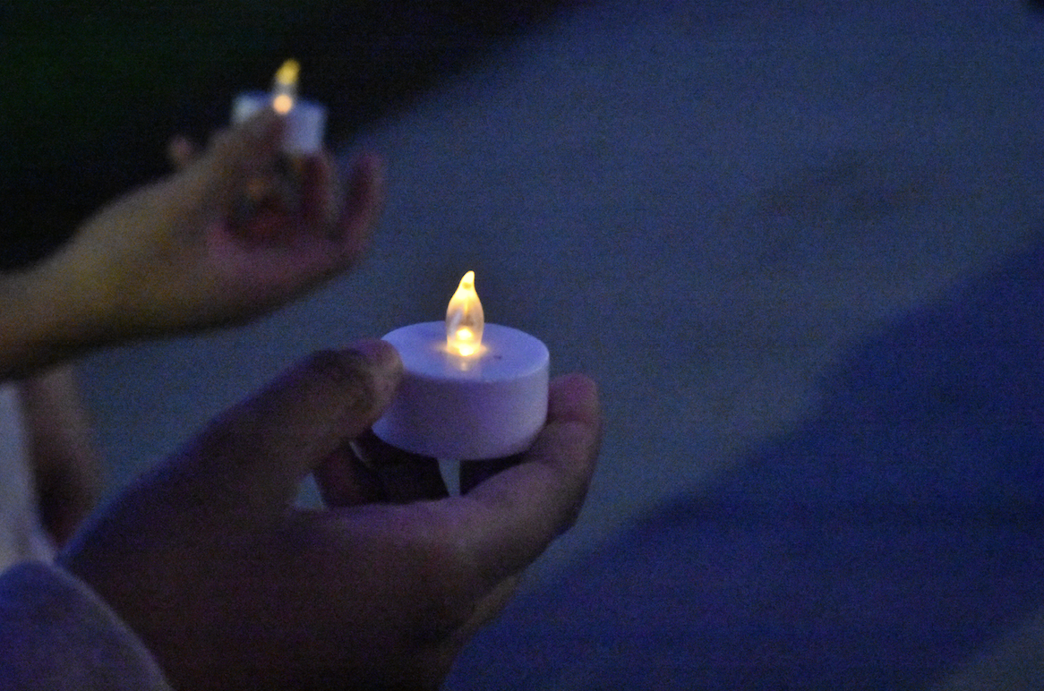 On the stairs of Deering Library, students held a vigil for Marcellus Khaliifah Williams Thursday evening, two days after his execution in Missouri.